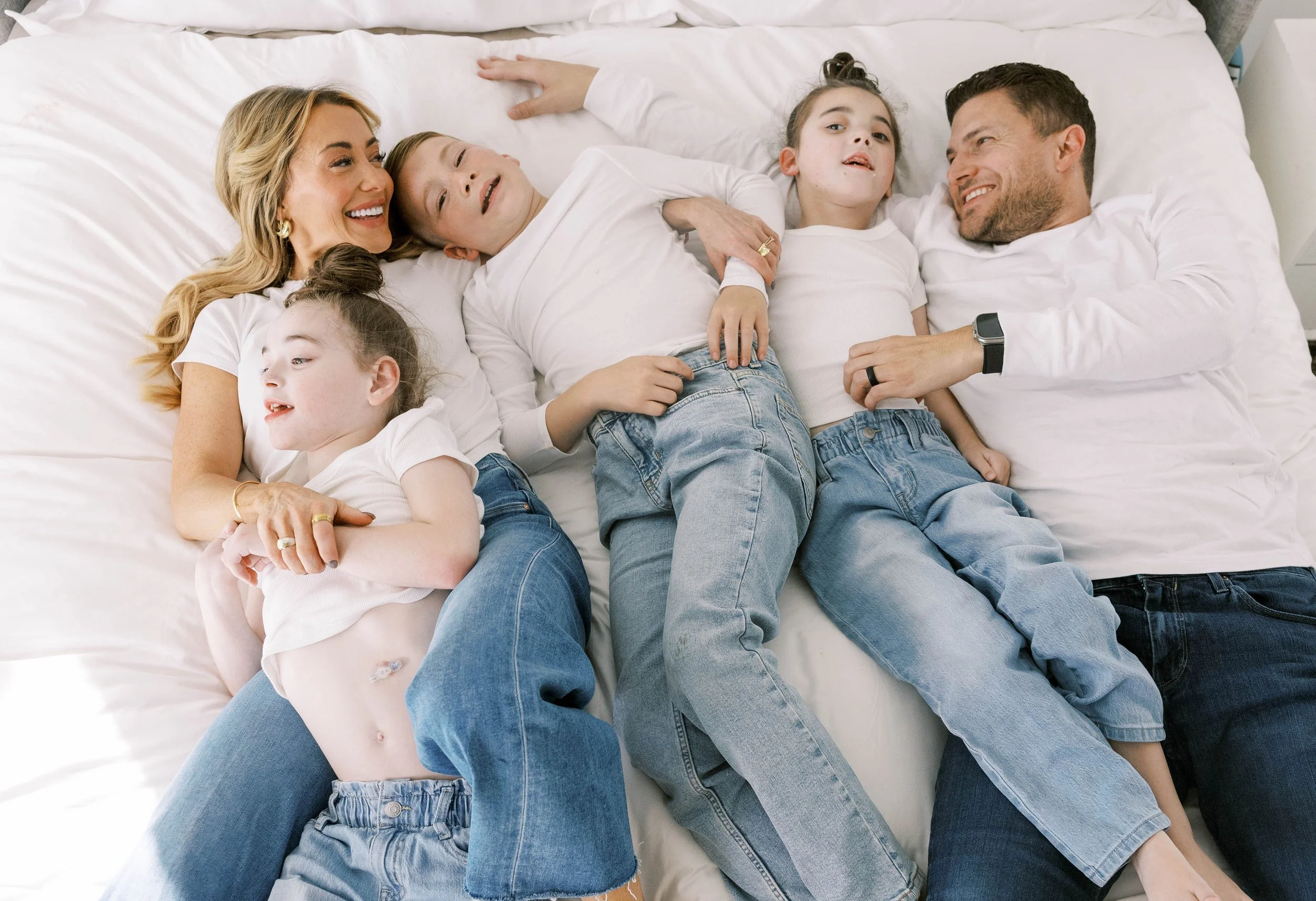 A family embracing in soft natural light